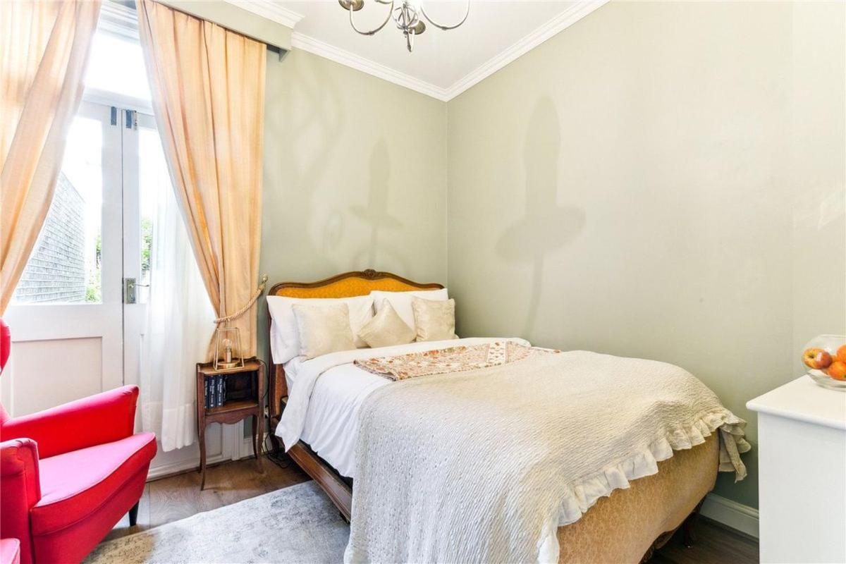 Appartement Homely 2 Levels Flat W Private Garden